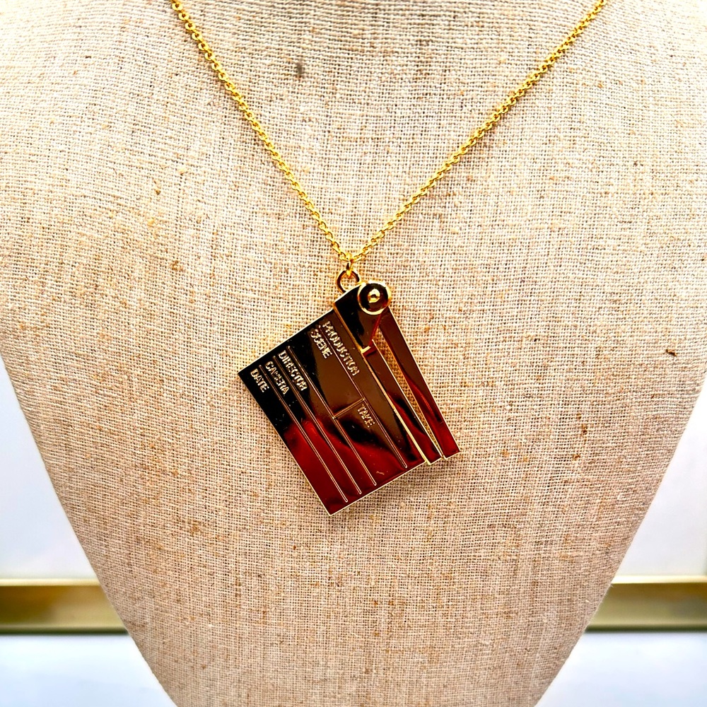 Very rare and HTF piece! 2013 Kate Spade Cinema City Movie Clapper Necklace.